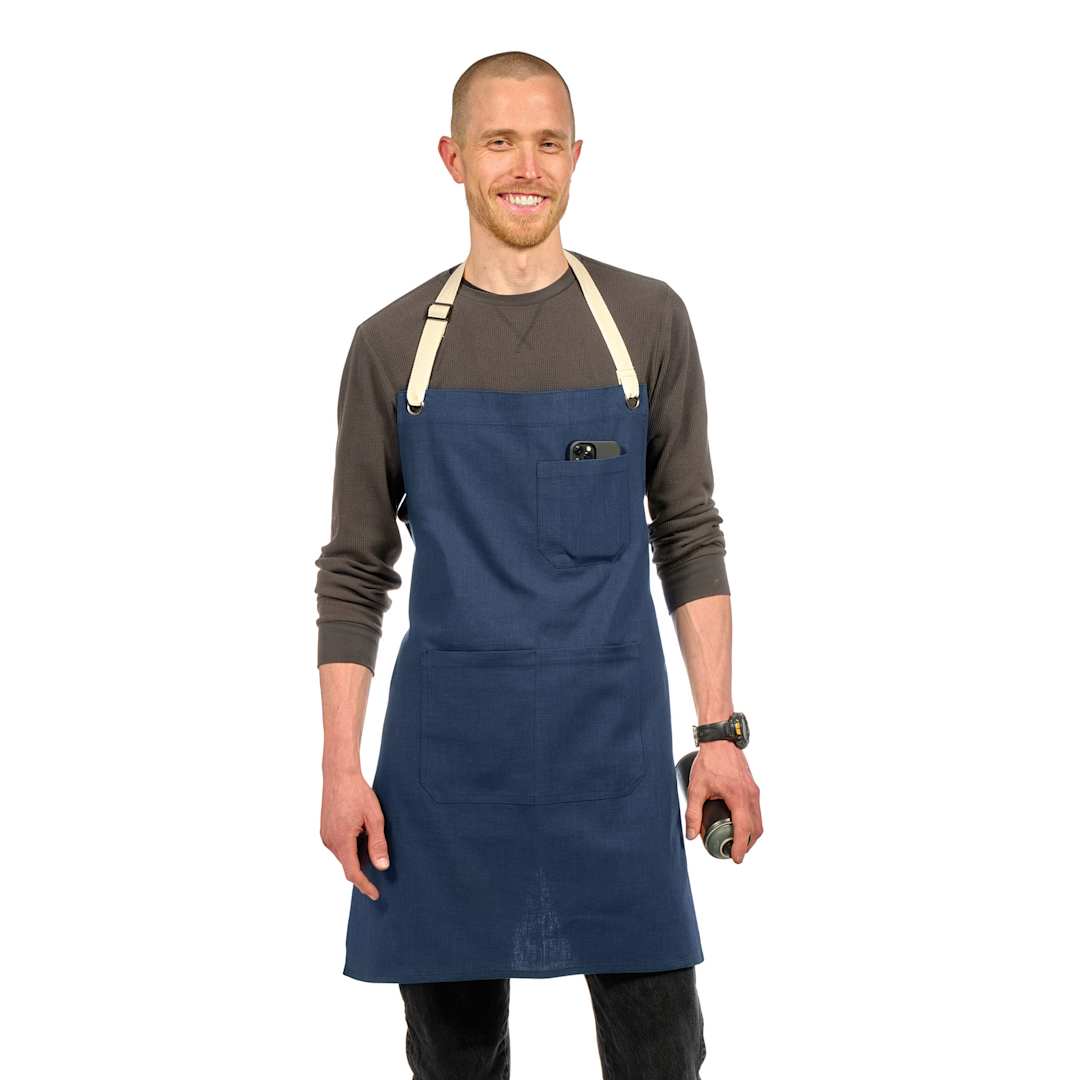 Open in modal - Front view of Blick Artisan Apron - Midnight Blue on a person