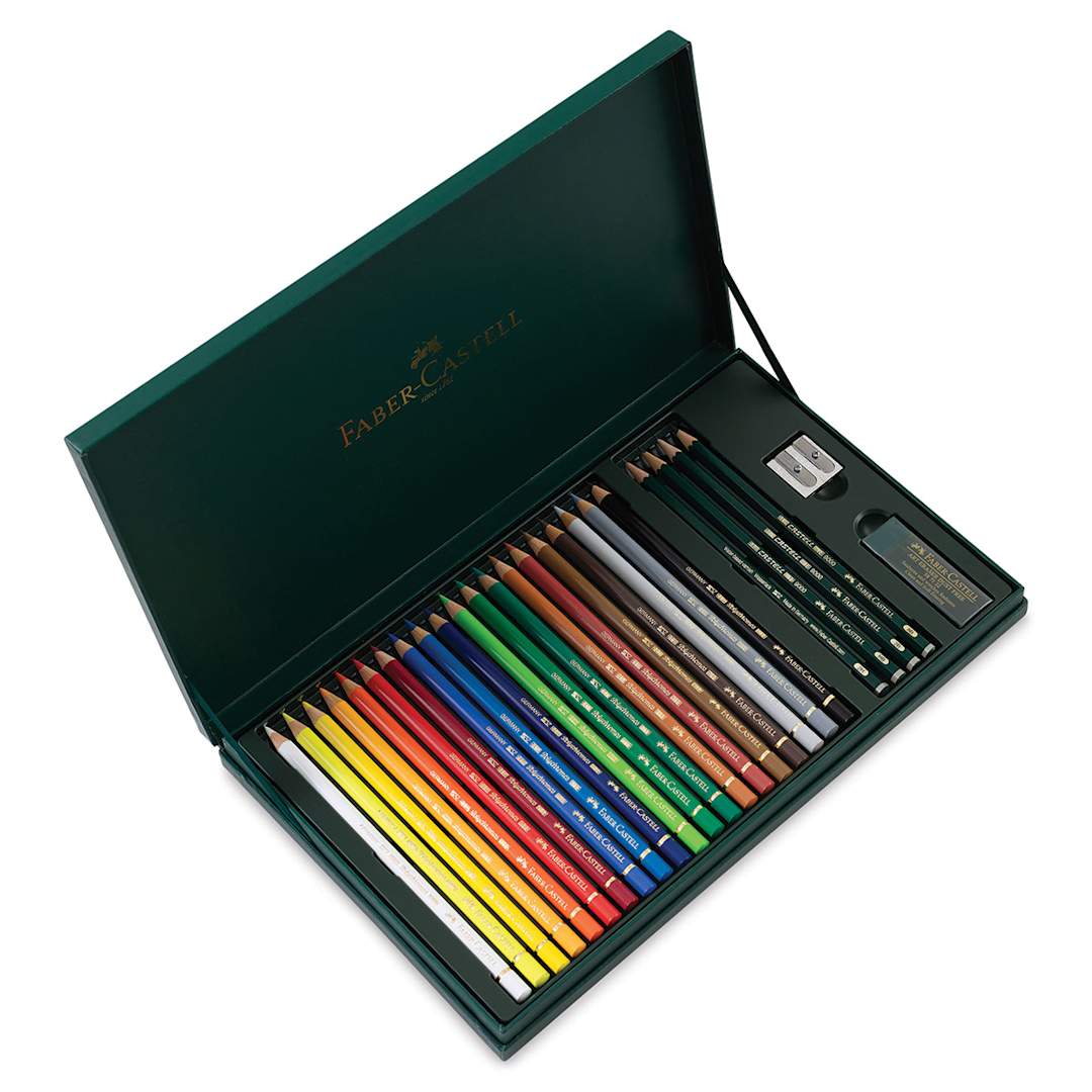 Open in modal - Faber-Castell Polychromos Gift Set of 24. Raised lid, row of pencils, sharpener, and eraser.