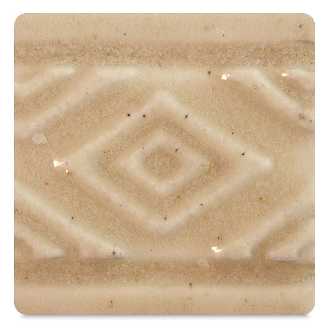 Open in modal - Amaco Potter's Choice Glazes - Iron Yellow, PC-38. Color sample with dark specs in yellow finish.