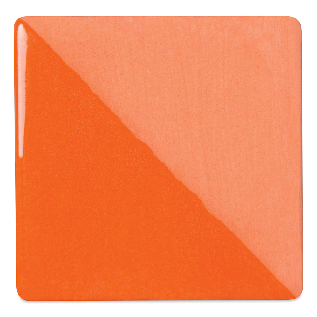 Open in modal - Speedball Ceramic Underglaze - Orange, Opaque, fired on white clay bisque tiles, half covered in Speedball Clear Glaze, fired to cone 05
