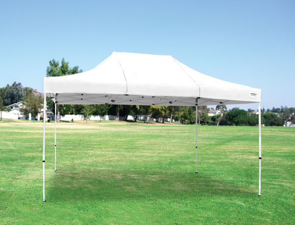 Open in modal - Caravan Classic Canopy - 10'x20' left angled view, in use outdoors