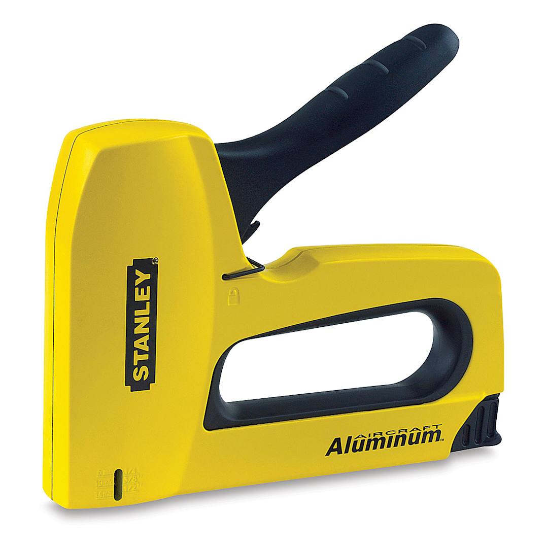 Open in modal - Stanley TR150 Heavy-Duty Sharpshooter Staple Gun - Side view of staple gun