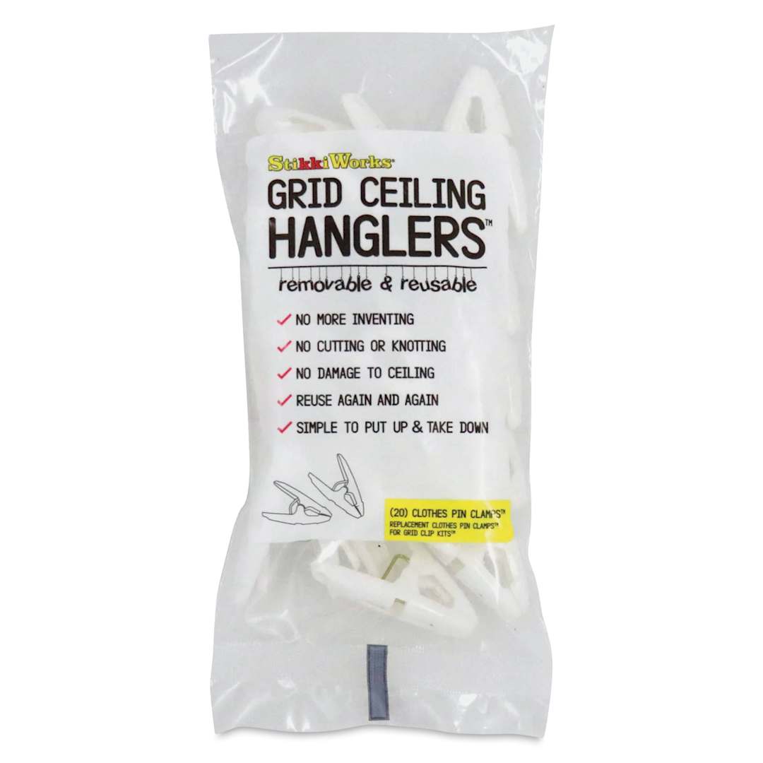 Open in modal - StikkiWorks Grid Ceiling Hanglers Clothes Pin Clamps, inside of the packaging. 