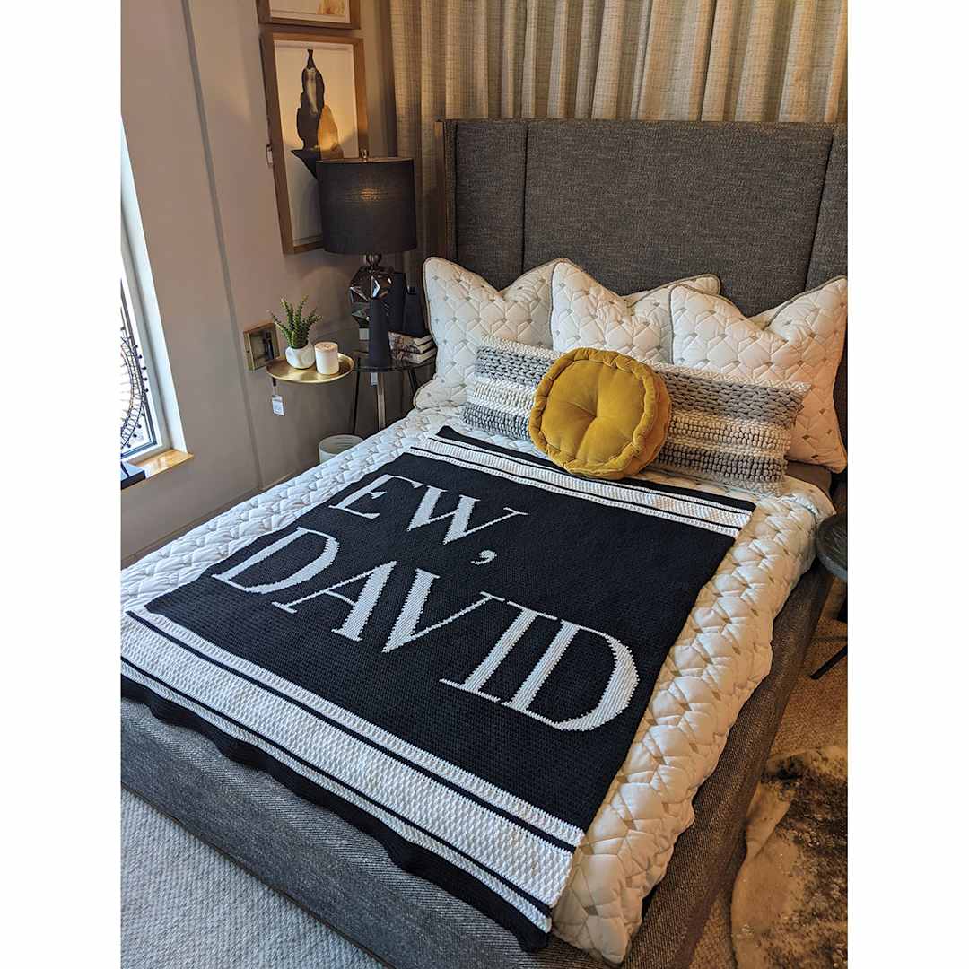 Open in modal - Lion Brand Schitt's Creek Yarn (Ew, David blanket on bed)