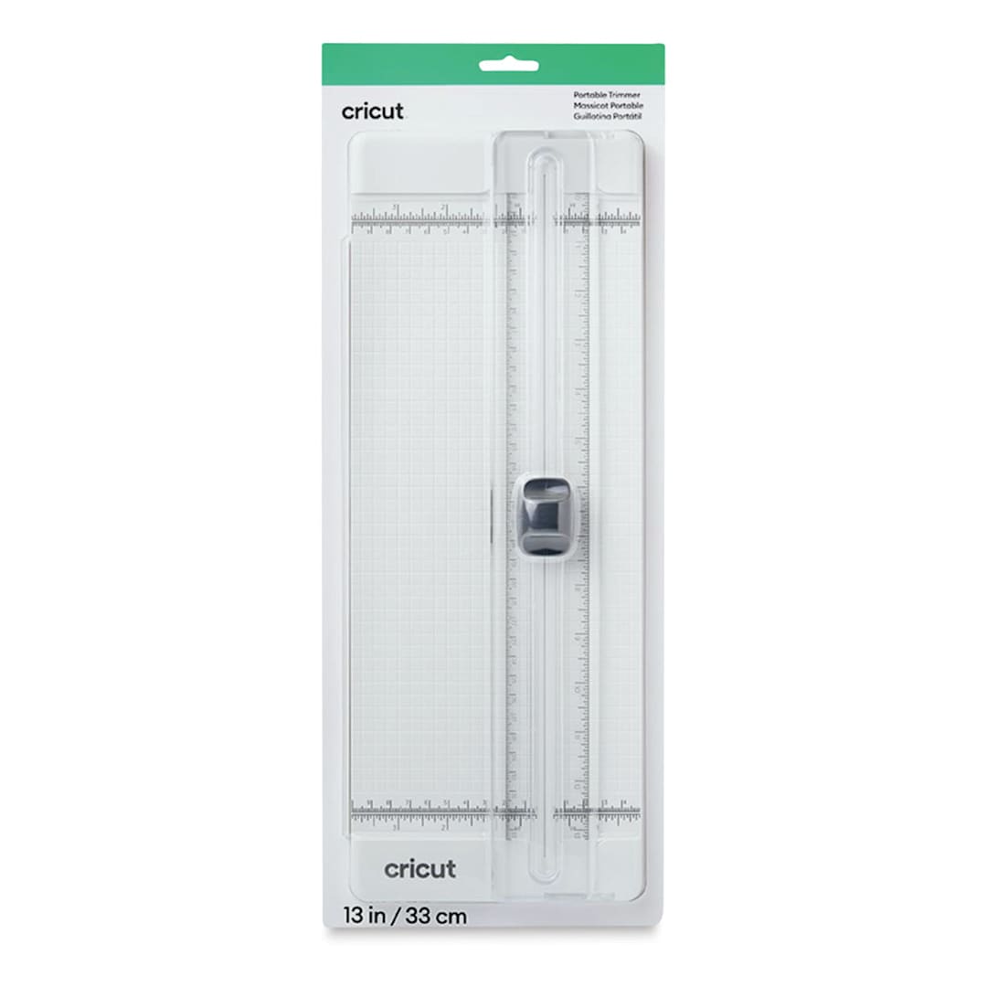 Open in modal - Cricut Portable Trimmer - Front view of blister packaging showing trimmer