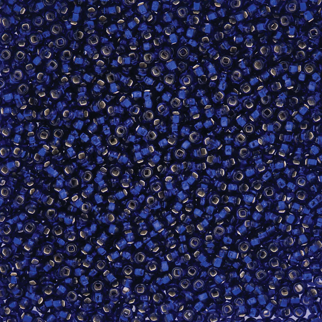 Open in modal - John Bead Czech Glass Seed Beads - Silver-Lined Royal Blue, 10/0, 22 g Vial close up