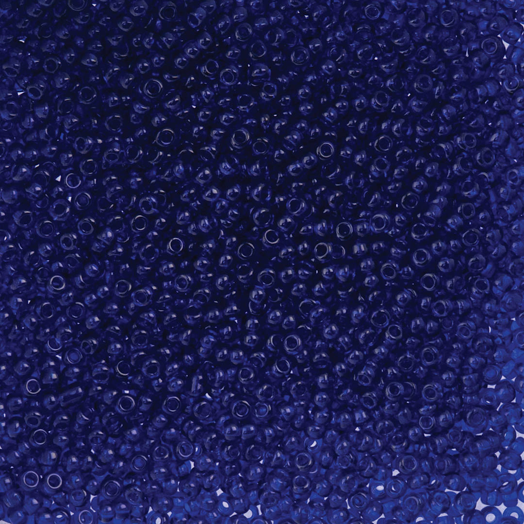 Open in modal - John Bead Czech Glass Seed Beads - Transparent Royal Blue, 10/0, 22 g Vial close up