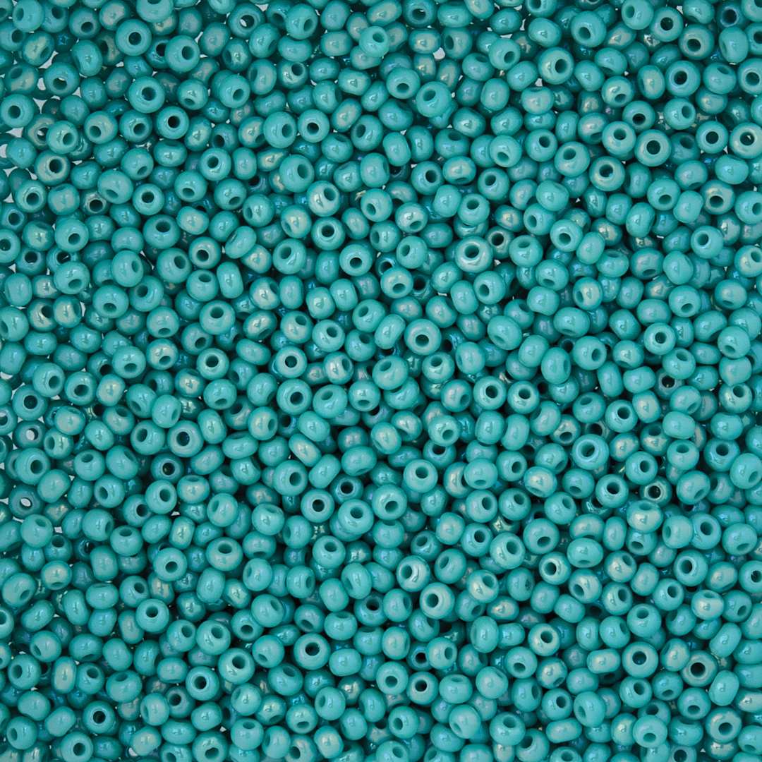 Open in modal - John Bead Czech Glass Seed Beads - Opaque Turquoise AB, 10/0, 22 g Vial close up