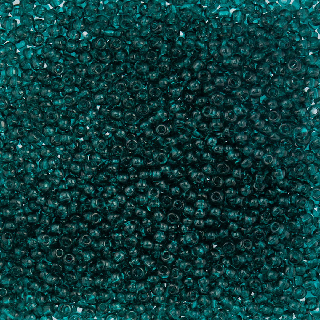 Open in modal - John Bead Czech Glass Seed Beads - Transparent Teal, 10/0, 22 g Vial close up