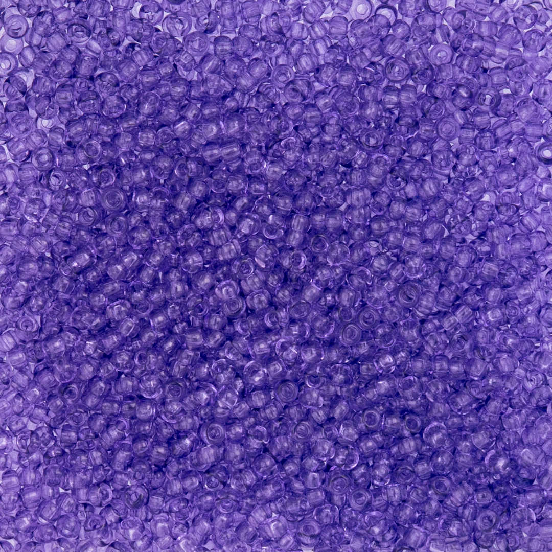 Open in modal - John Bead Czech Glass Seed Beads - Transparent Tanzanite, 10/0, 22 g Vial close up