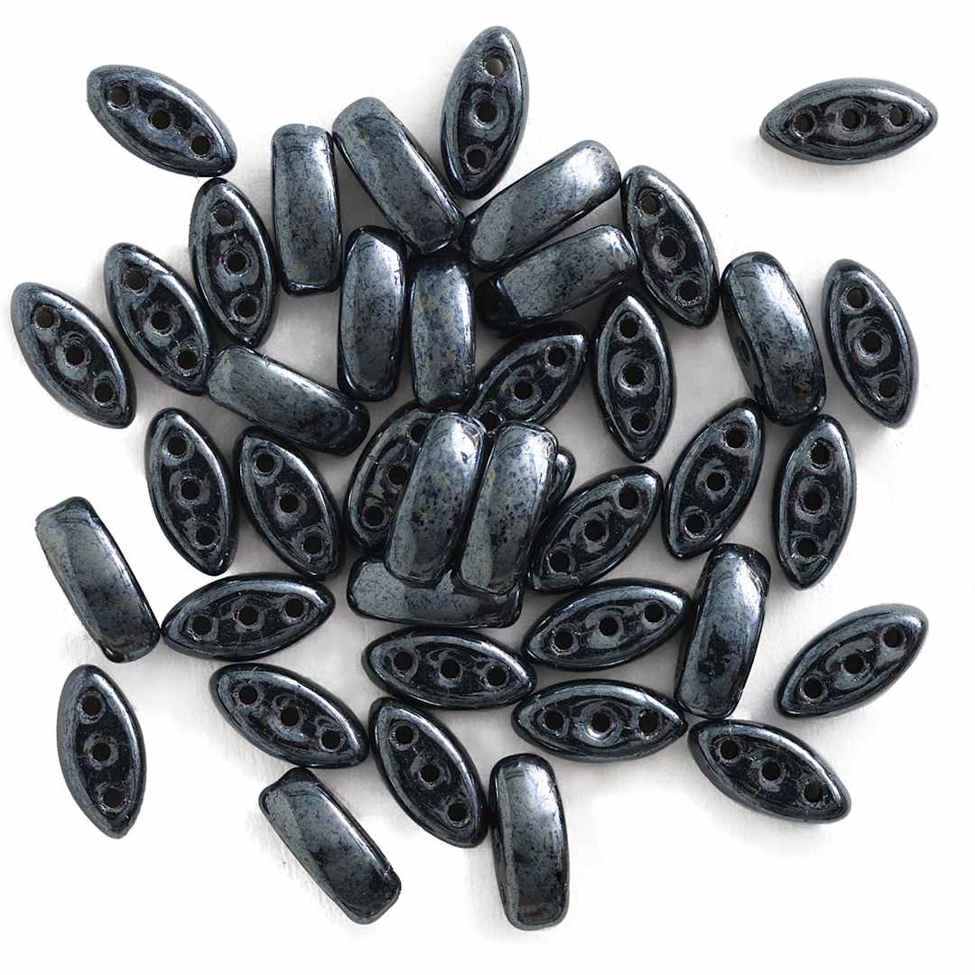 Open in modal - John Bead Czech Glass Cali Three-Hole Beads - Black and Hematite beads in loose pile