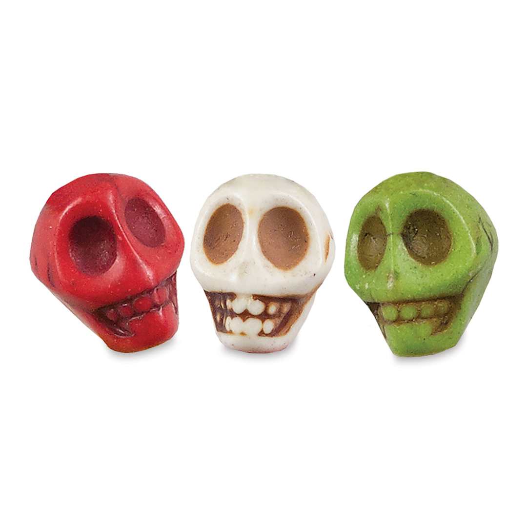 Open in modal - John Bead Semi-Precious Skull Beads - Closeup of three 10 mm Multicolor Skull Beads
