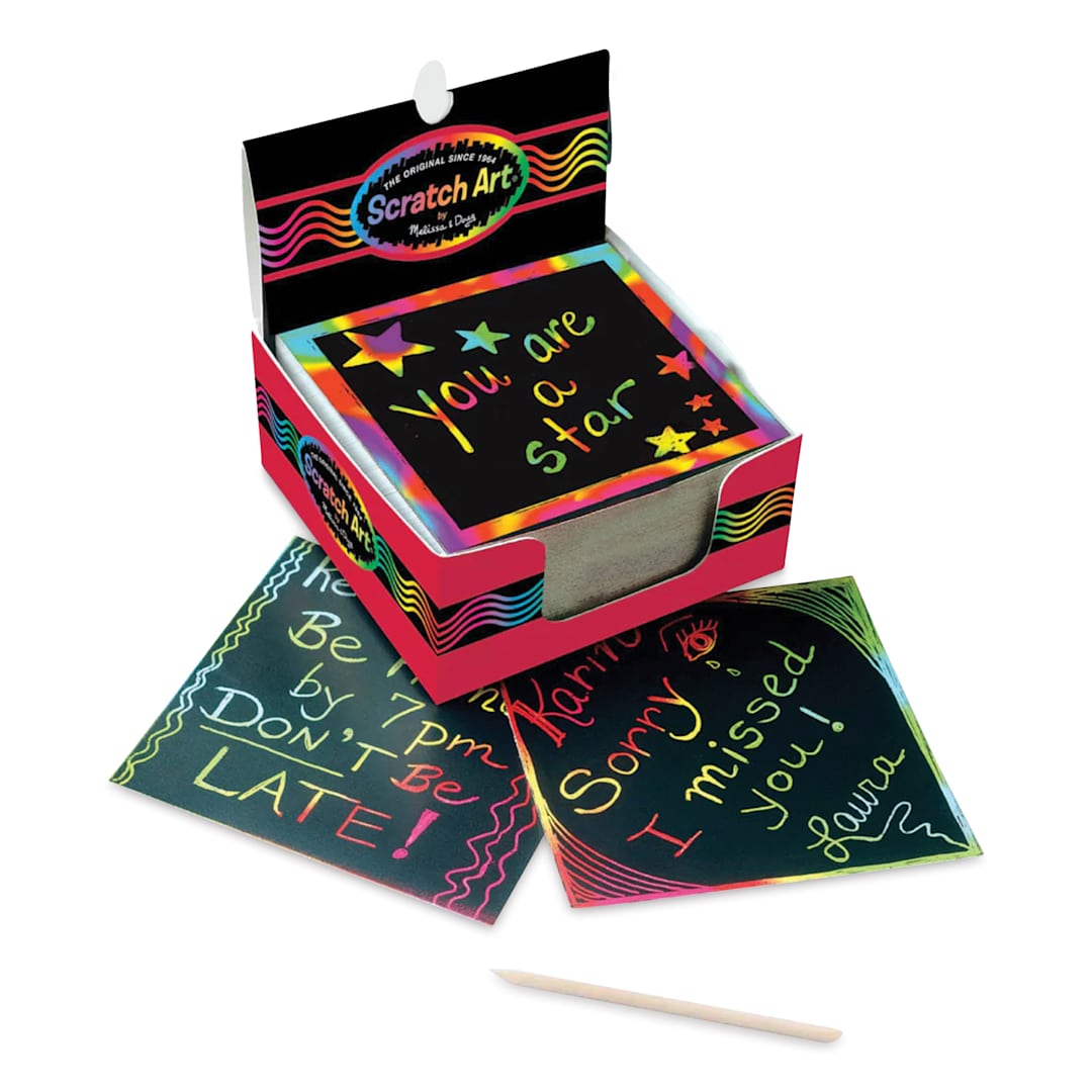 Open in modal - Melissa & Doug Scratch Art Mini Rainbow-colored notes and stylus laid outside of the packaging 