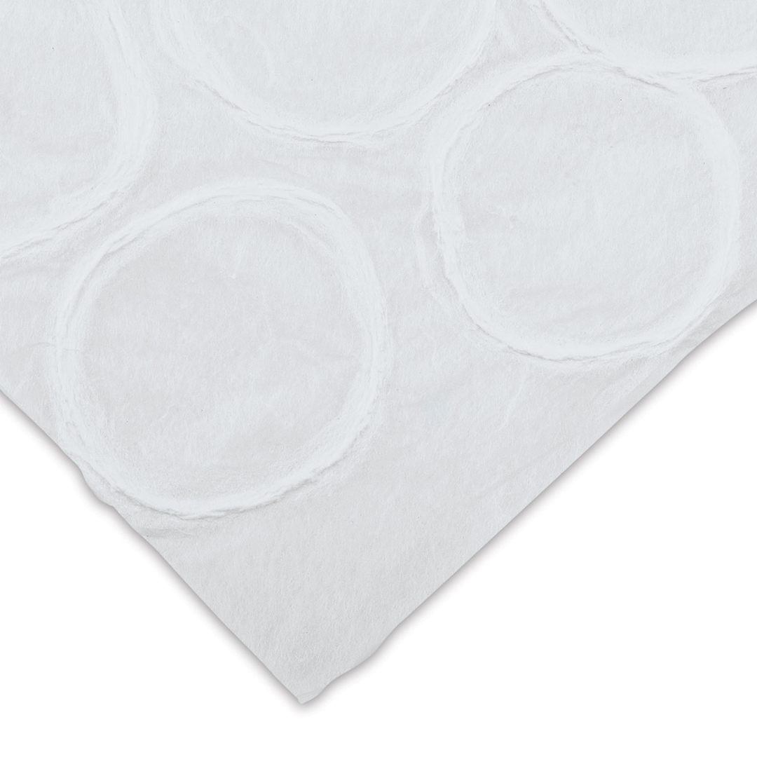 Open in modal - Black Ink Thai Mulberry Beehive Paper - Closeup of corner of White Beehive paper showing circles