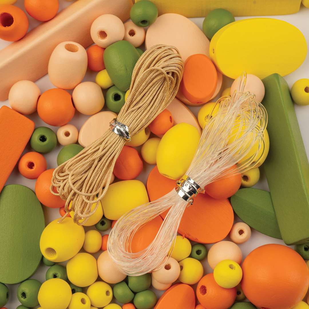Open in modal - John Bead Wood Craft Beads - Orange, Green, Yellow and Light Peach, 90 g Bag showing included nylon cords