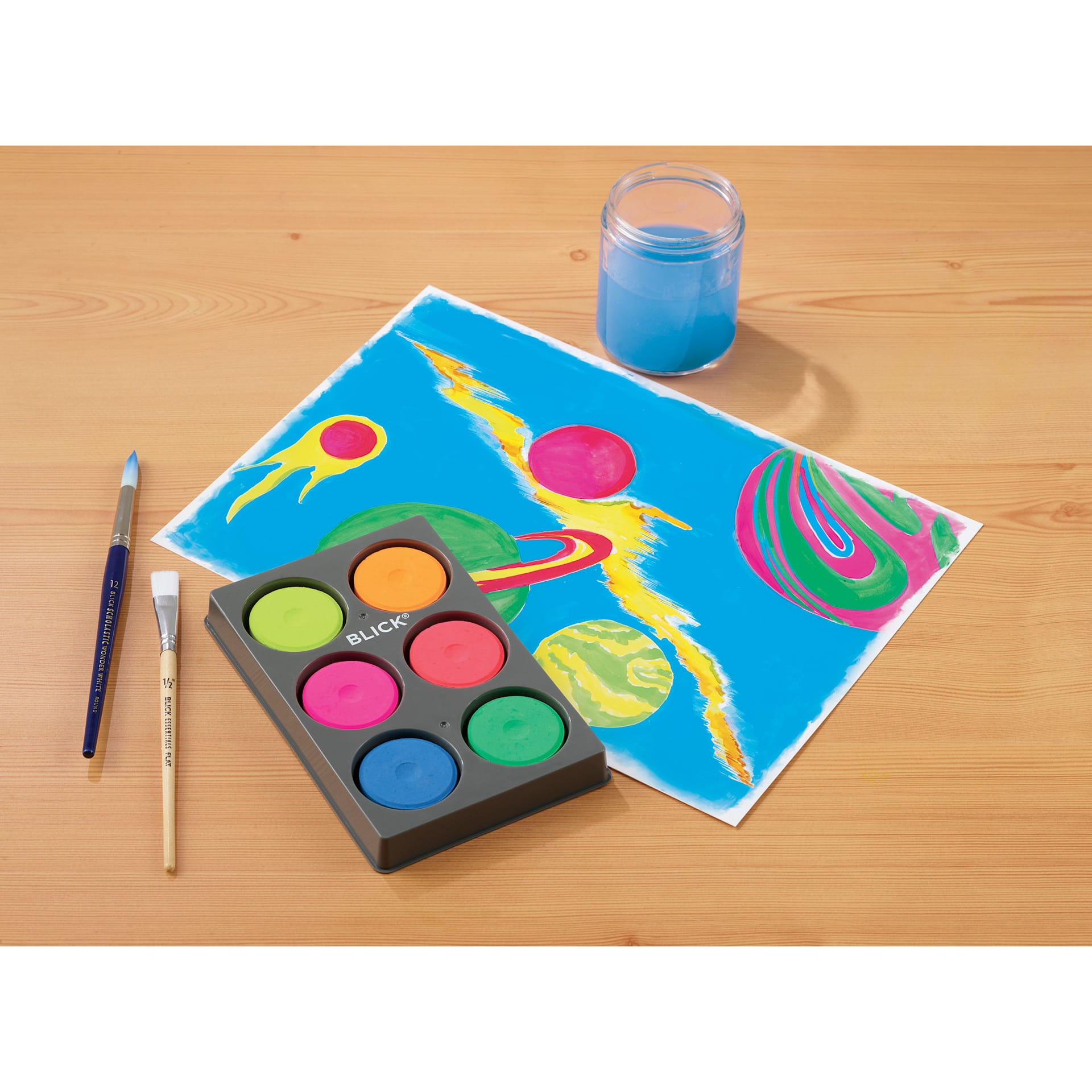 Blick Essentials Tempera Cakes Set of 6 Fluorescent Colors with a Tray, brushes, cup of water, and an abstract painting.