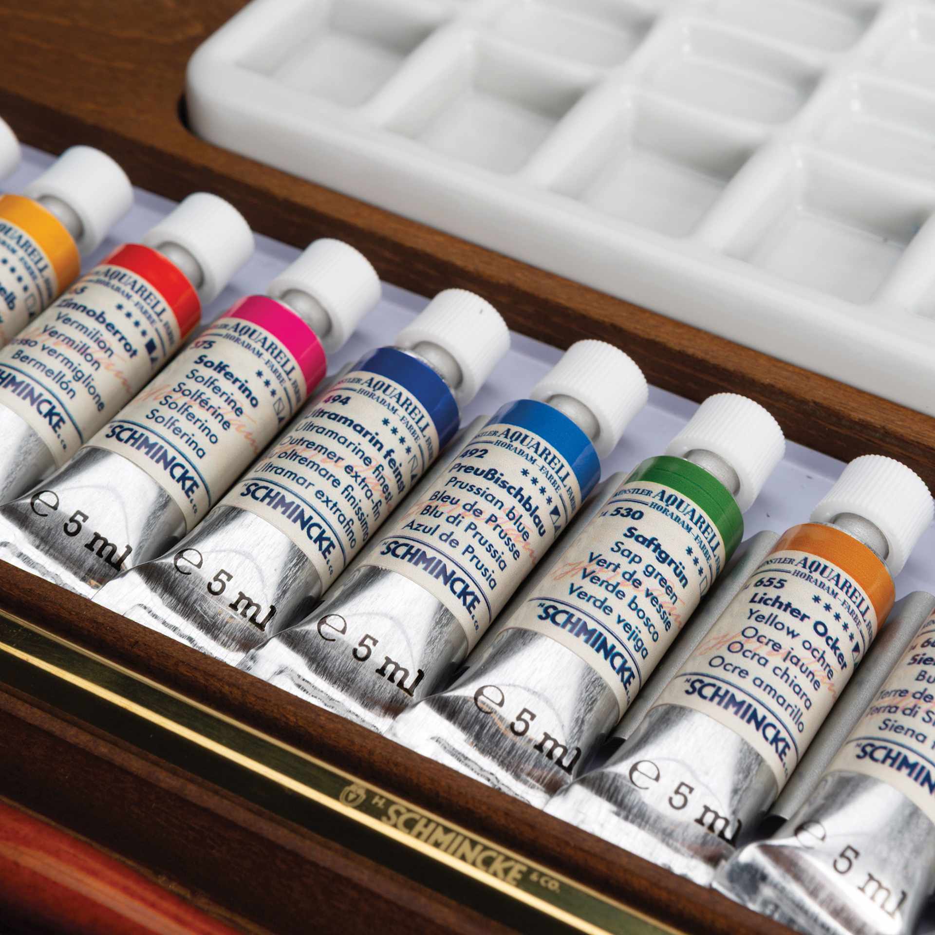 Schmincke Horadam Aquarell Artist Watercolor - Set of 12, Retro II, 5 ml Tubes close up of included tubes and palette
