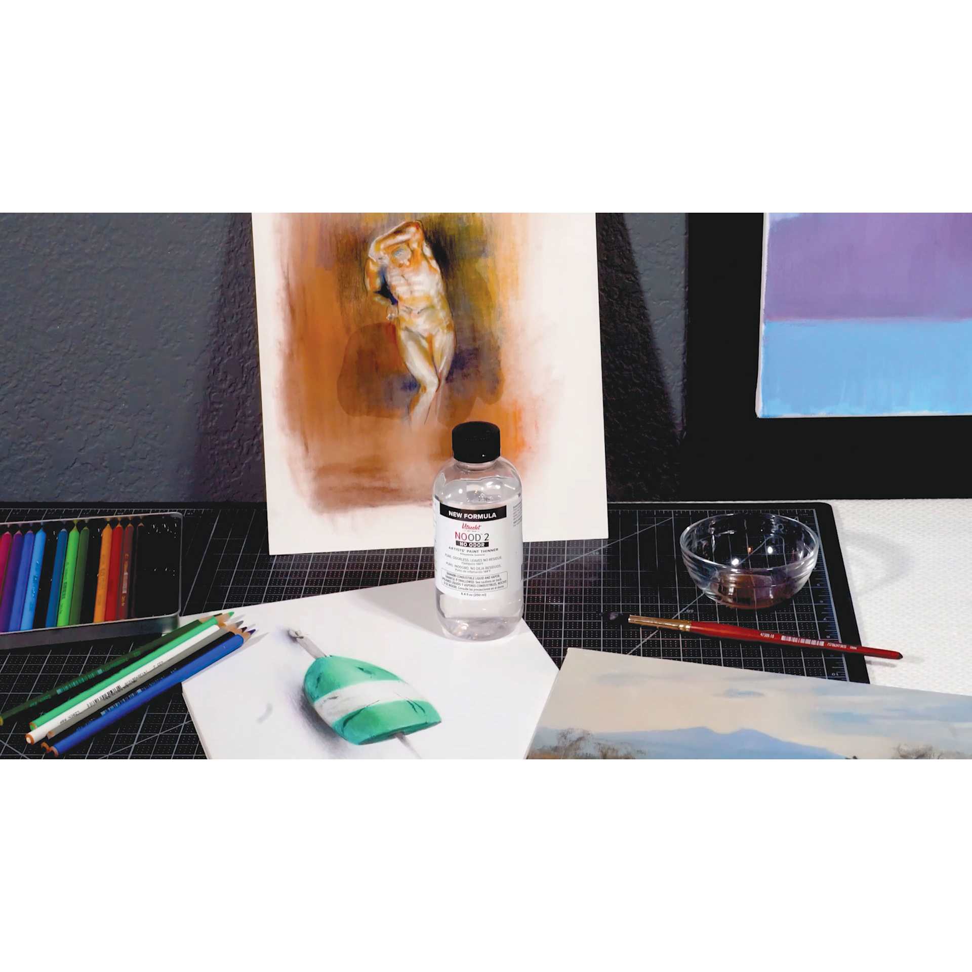 Utrecht NOOD 2 Odorless Thinner, on desk with paintings