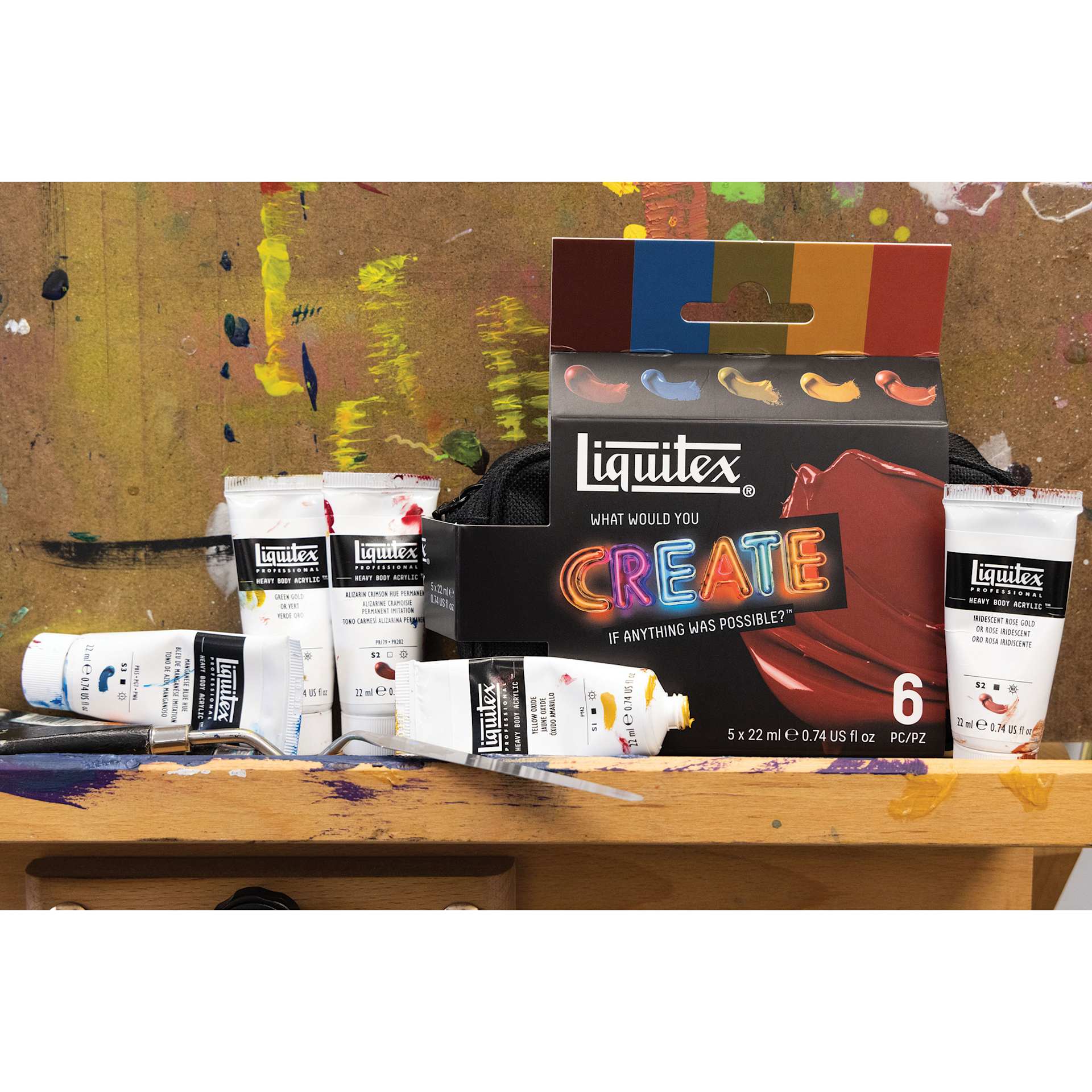 Liquitex Professional Heavy Body Acrylics - Set of 5, WWYC Retro Luxe, 22 ml Tubes on a studio table