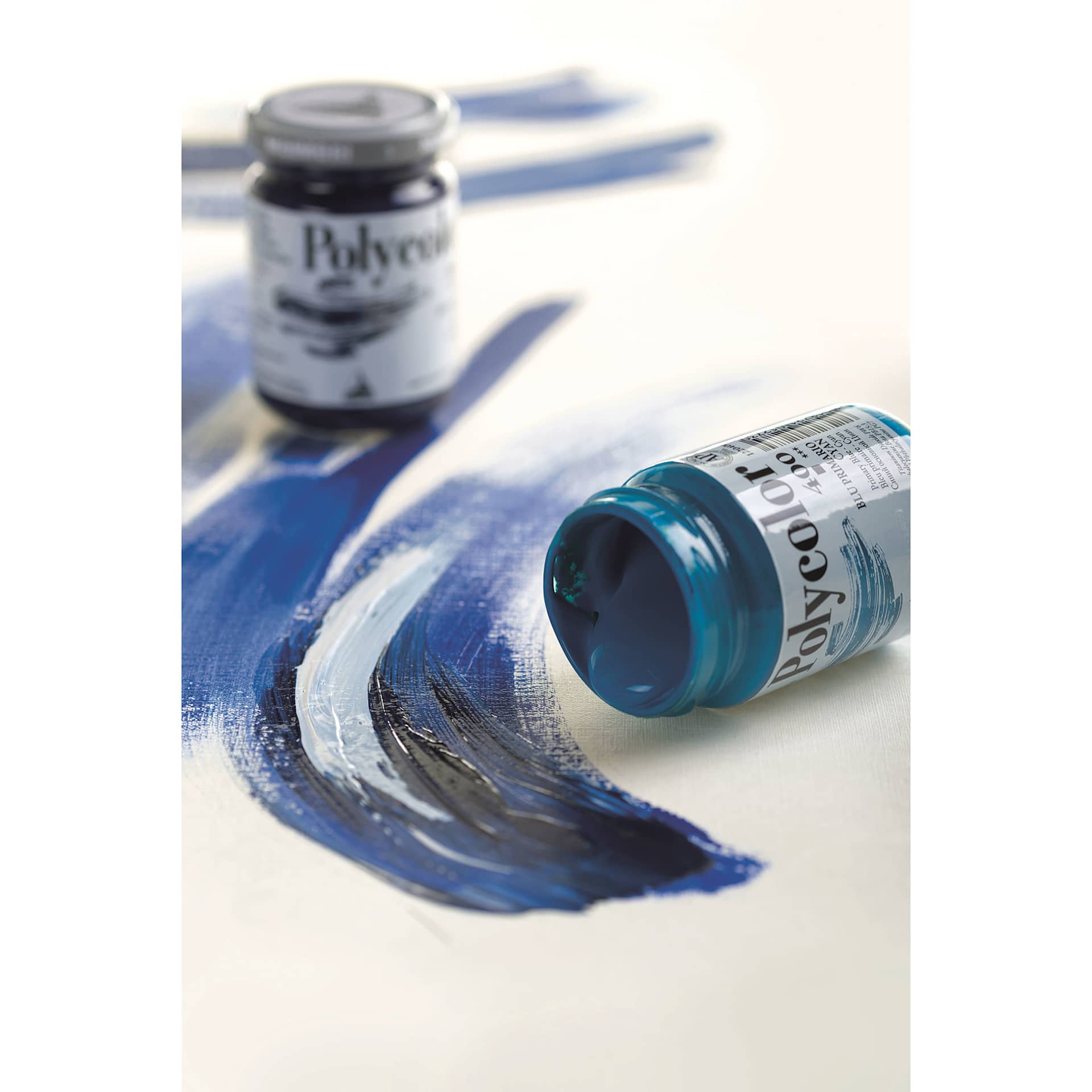 Maimeri Polycolor Vinyl Paints with swatches of color.