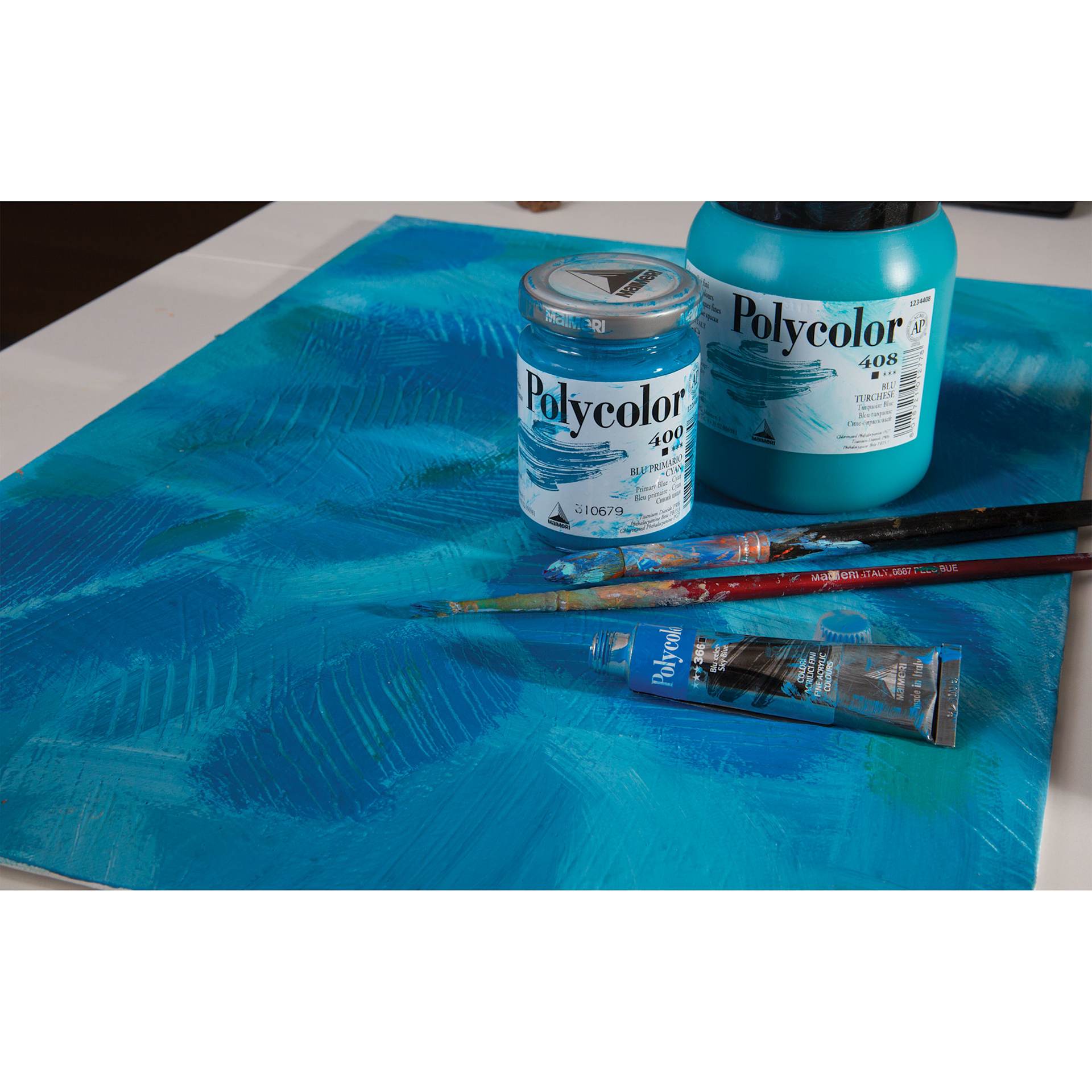 Maimeri Polycolor Vinyl Paints (jars of paints on a blue painting)