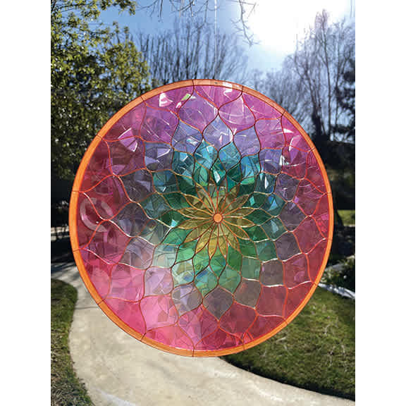 Alumilite Amazing Clear Cast Outdoor Epoxy used on an wall hanging in the sun