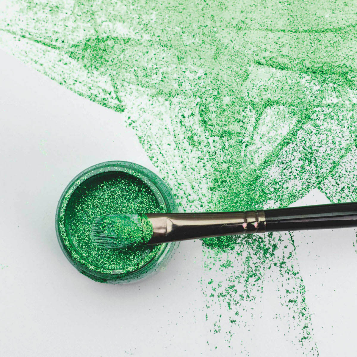Angelus Glitterlites Flexible Glittercoat Paint - Top view of swath of Green with open jar and brush