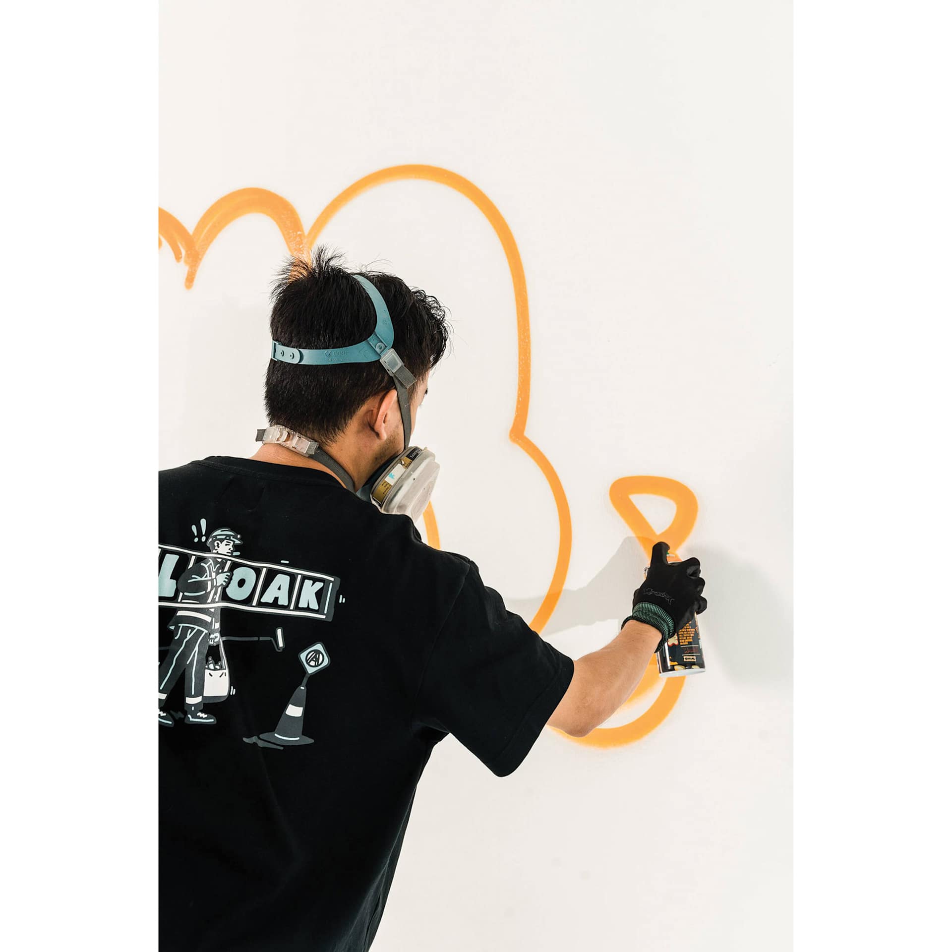 Montana Black Artist Series Spray Paint, Cloakwork (Wall being spray painted)