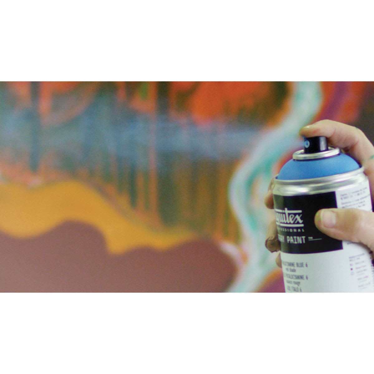 Liquitex Professional Spray Paint - Person using spray paint