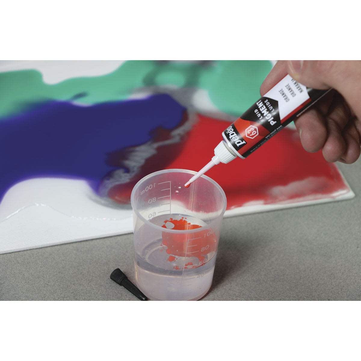 Pebeo Fluid Pigments - Hand dripping Red pigment into Glass