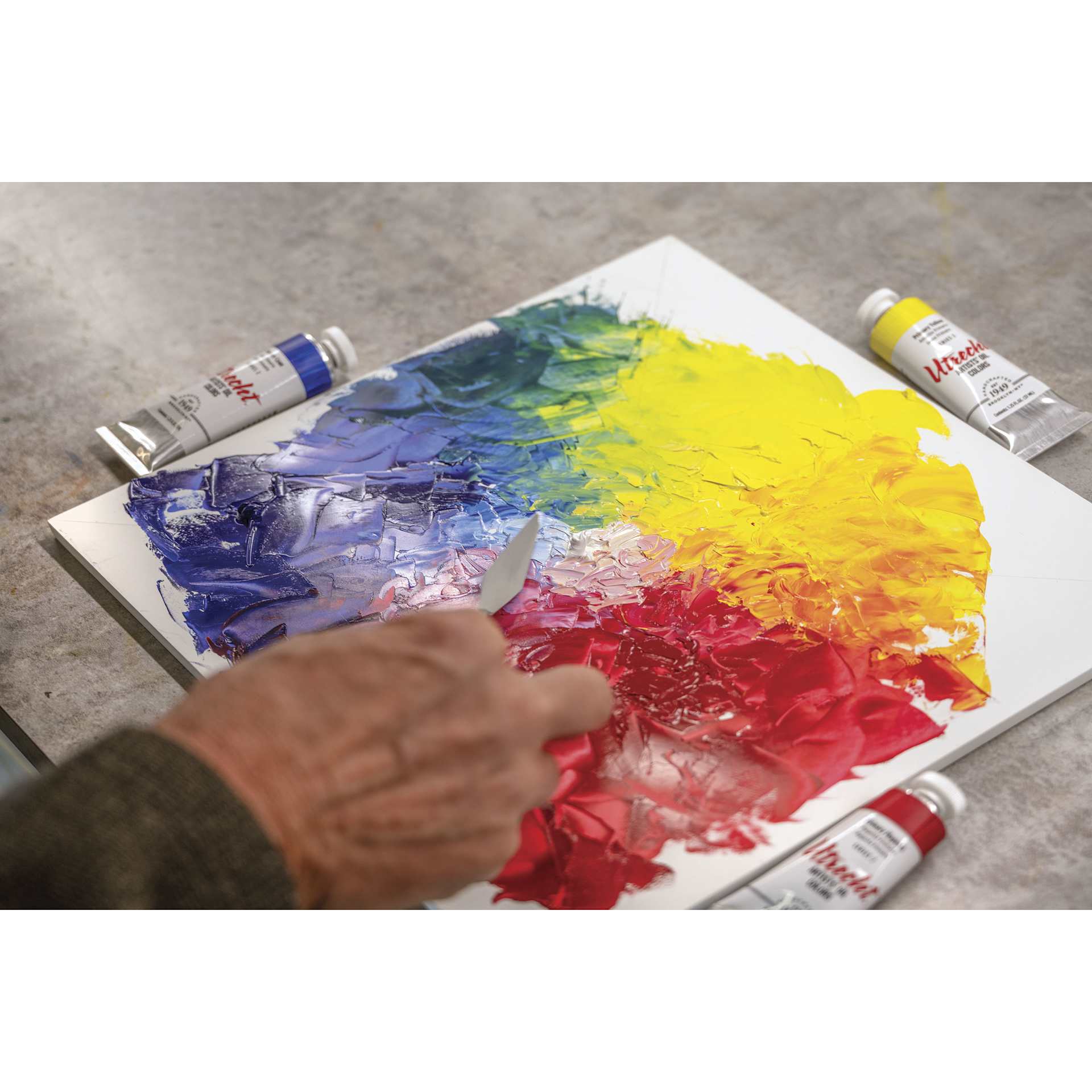 Utrecht Artists' Oil Paint - Set of 3, CMY Mixing Colors being mixed on a canvas panel