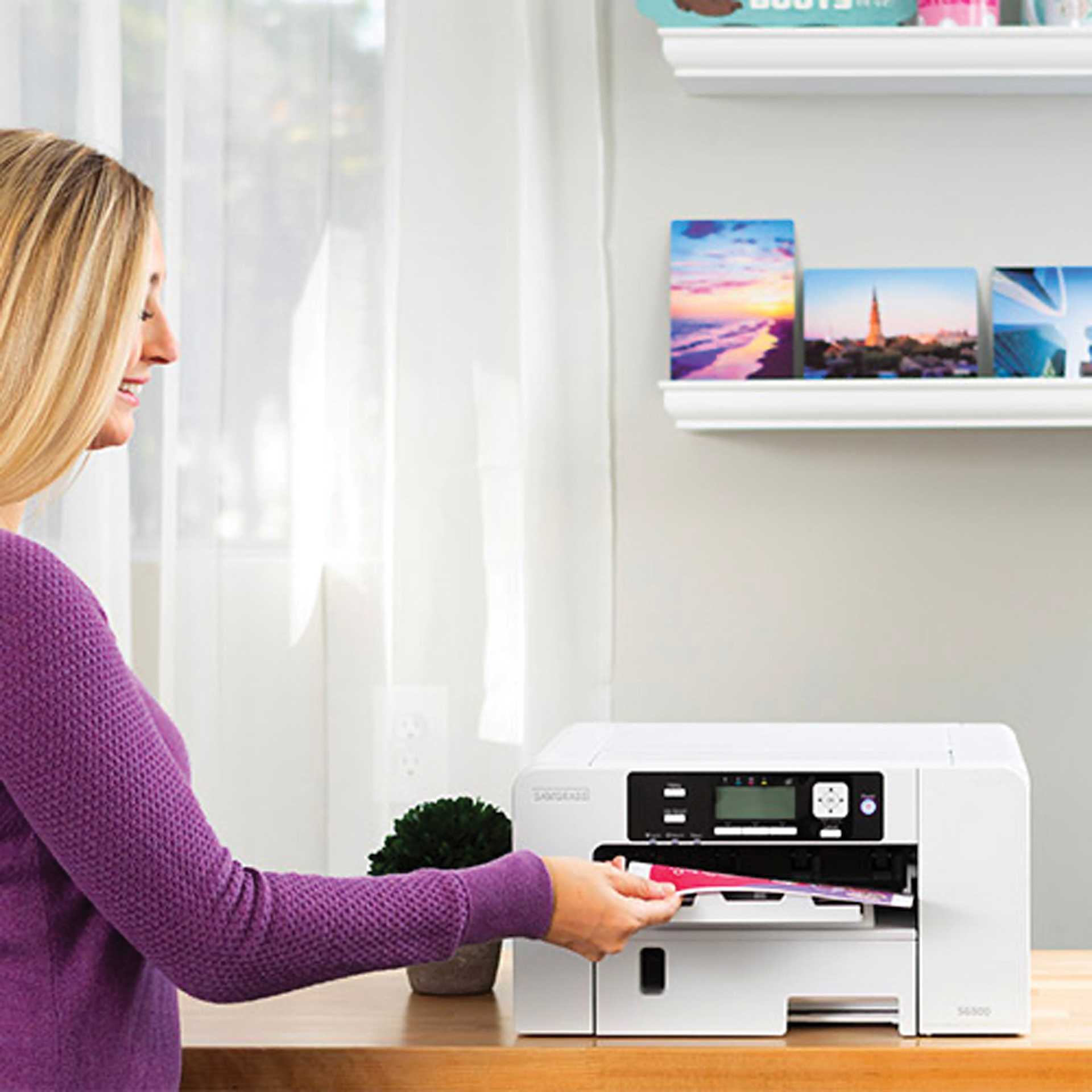 Sawgrass Sublimation Printer - SG500 (person removing paper from printer)