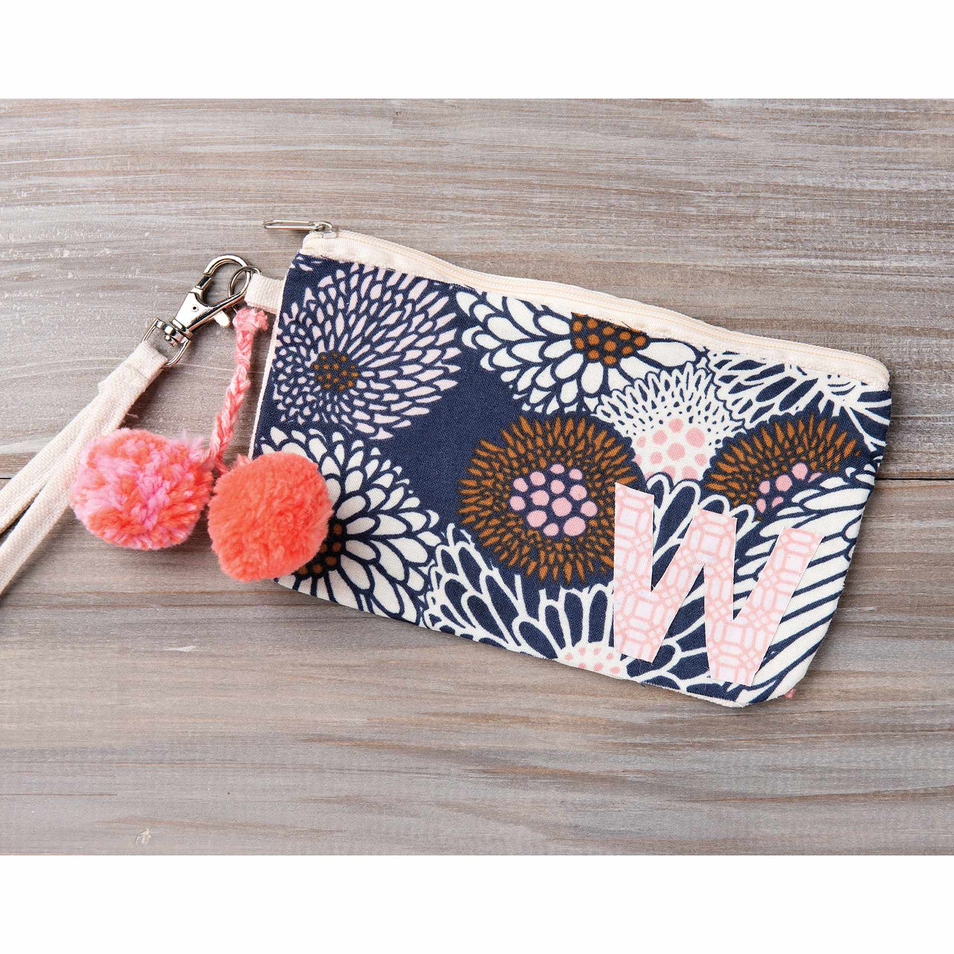 Painted hand bag with adhered pattern paper sealed with Mod Podge Fabric