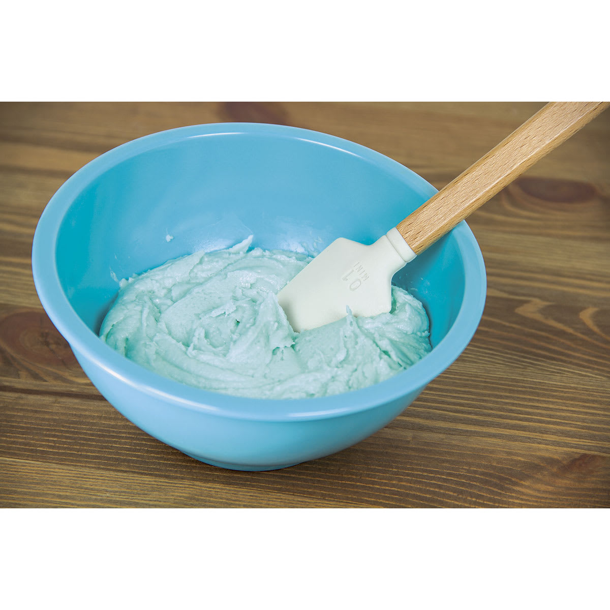 Princeton Catalyst Blades - Mini-blade in a blue bowl of a paste-like liquid