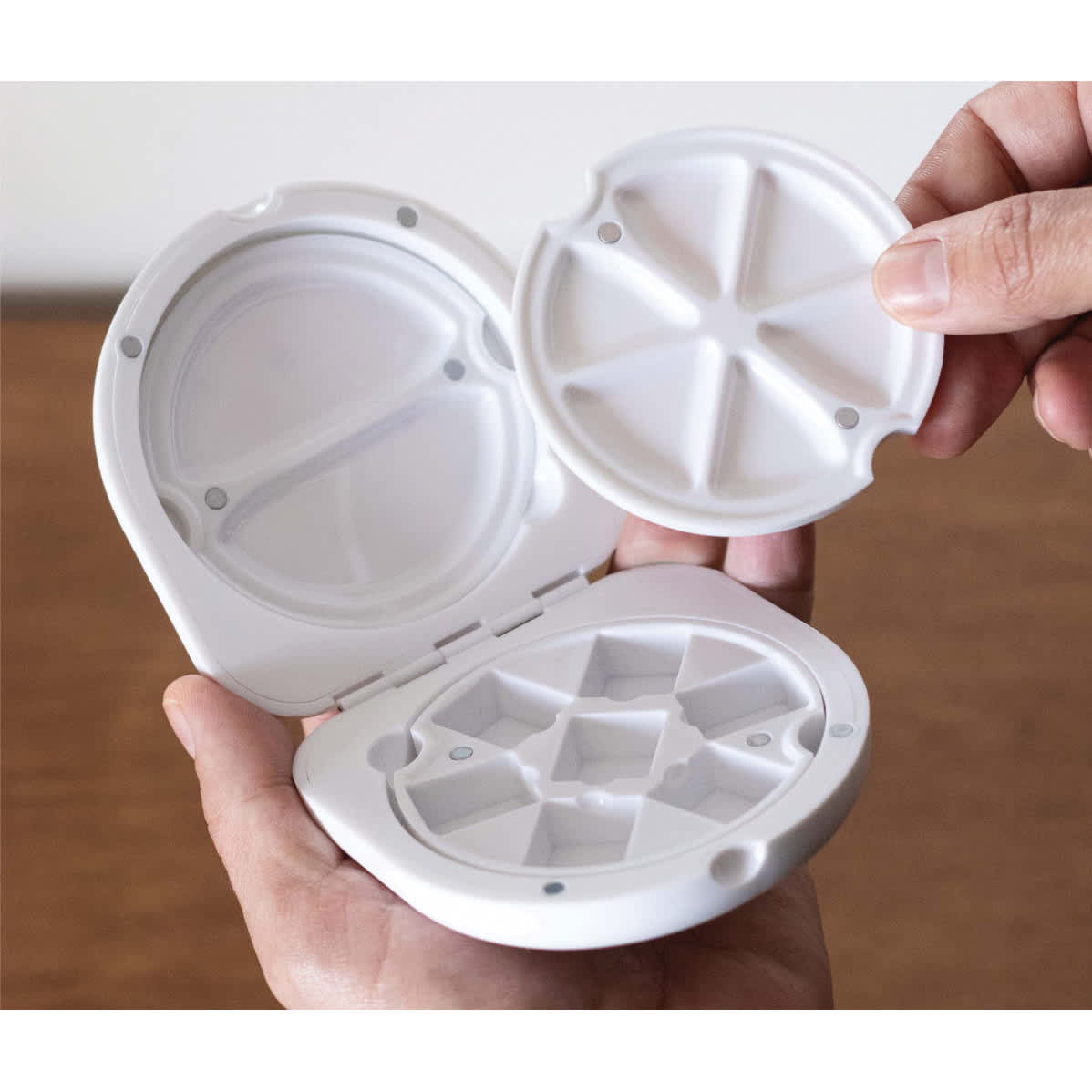 Etchr Travel Pocket Palette, open to show mixing wells and compartment for 7 half-pans