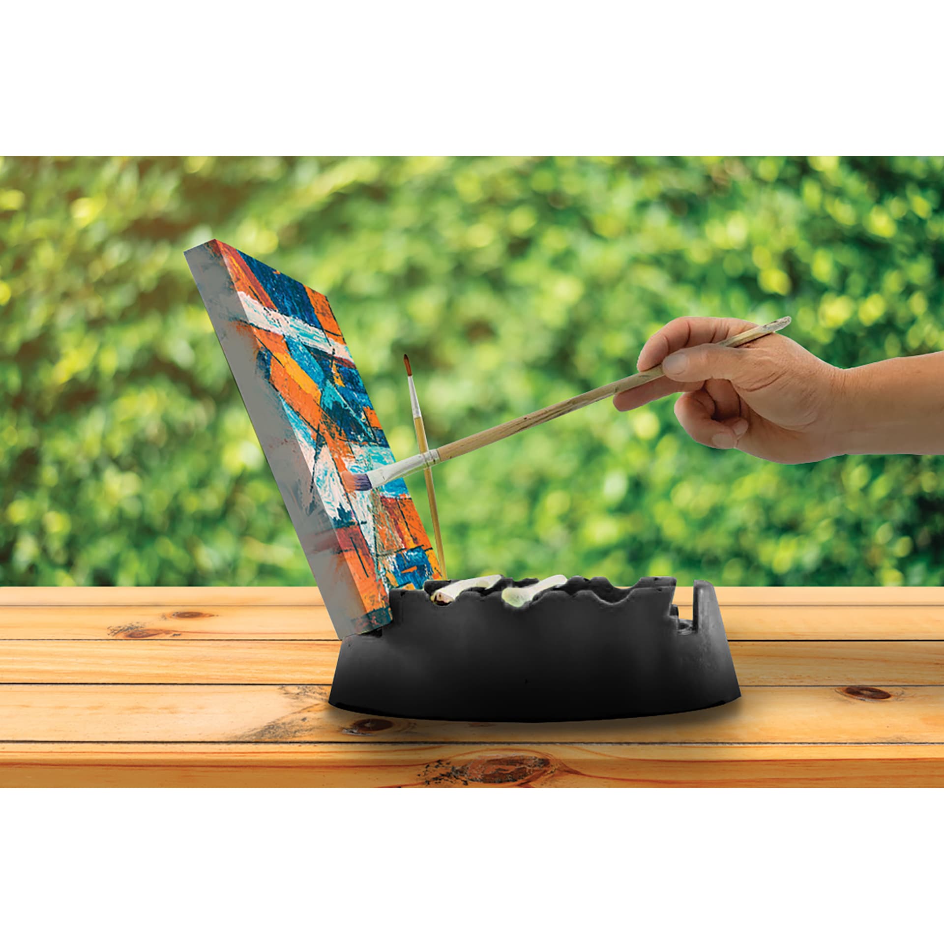 GoEasel Painting Station - Black, artist using painting station