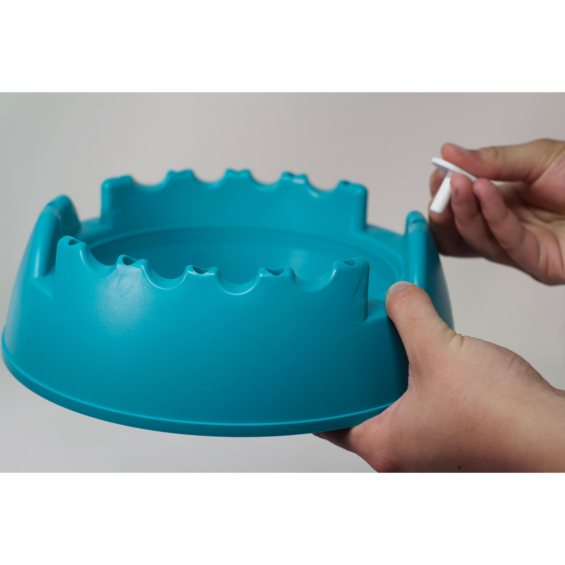 GoEasel Painting Station - Teal, canvas clip being inserted (not included)