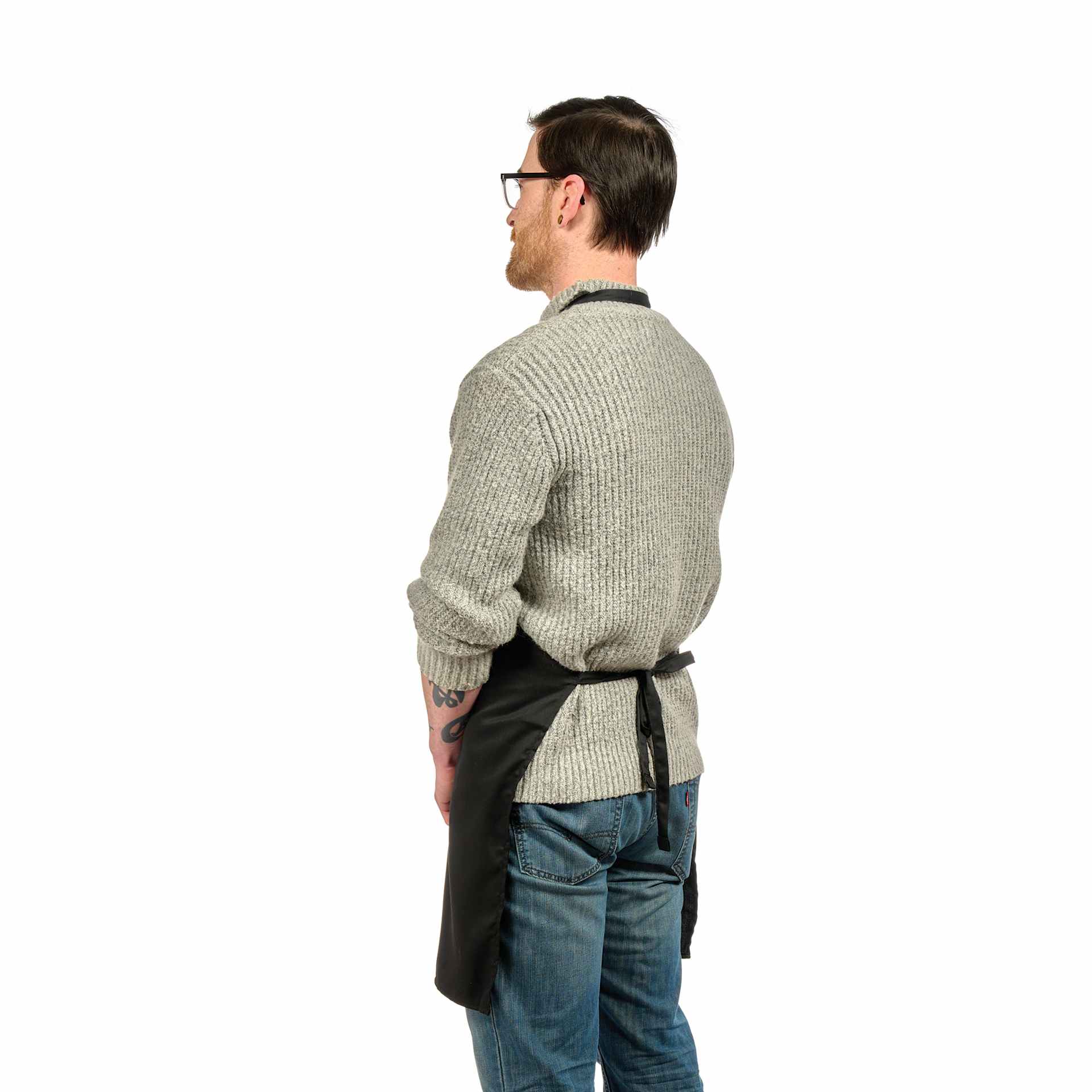 Back view of Blick Classic Black Apron with Logo on a person