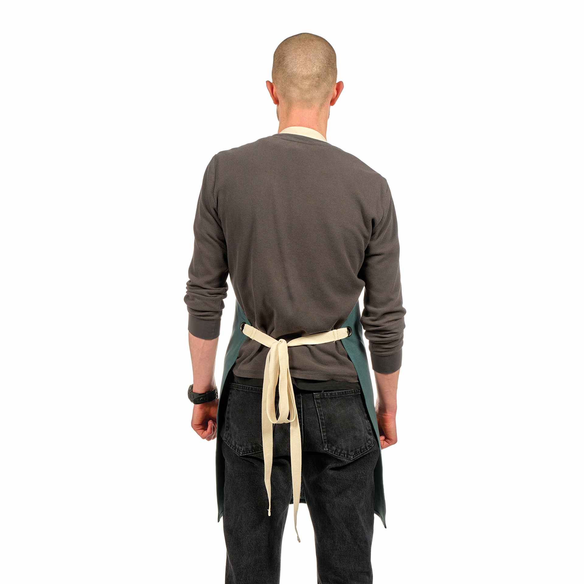 Back view of Blick Artisan Apron - Pine Green on a person