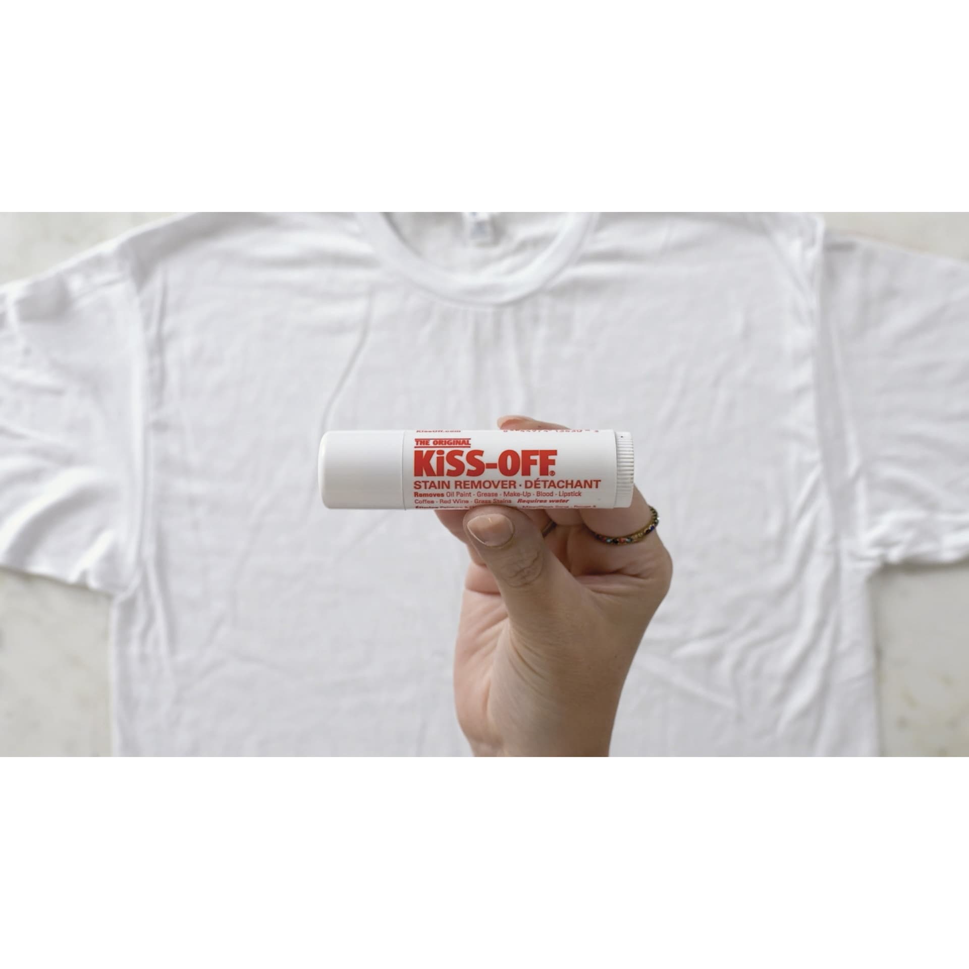 Kiss-Off Stain Remover with t-shirt in background