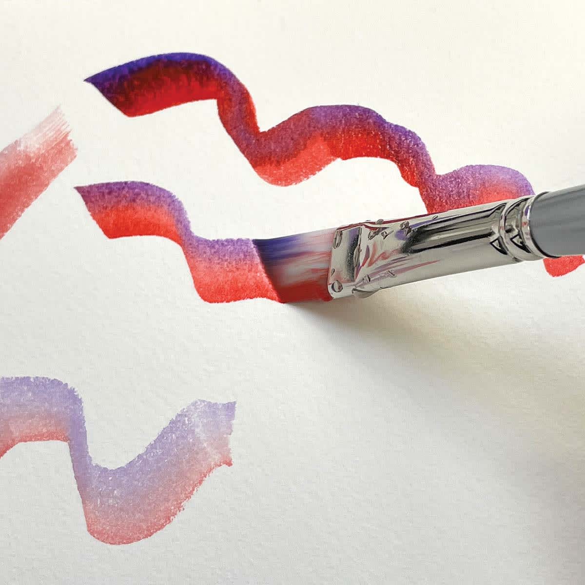 Silverwhite Soft Synthetic Brush - Closeup of Angular Brush used to paint red and purple waves