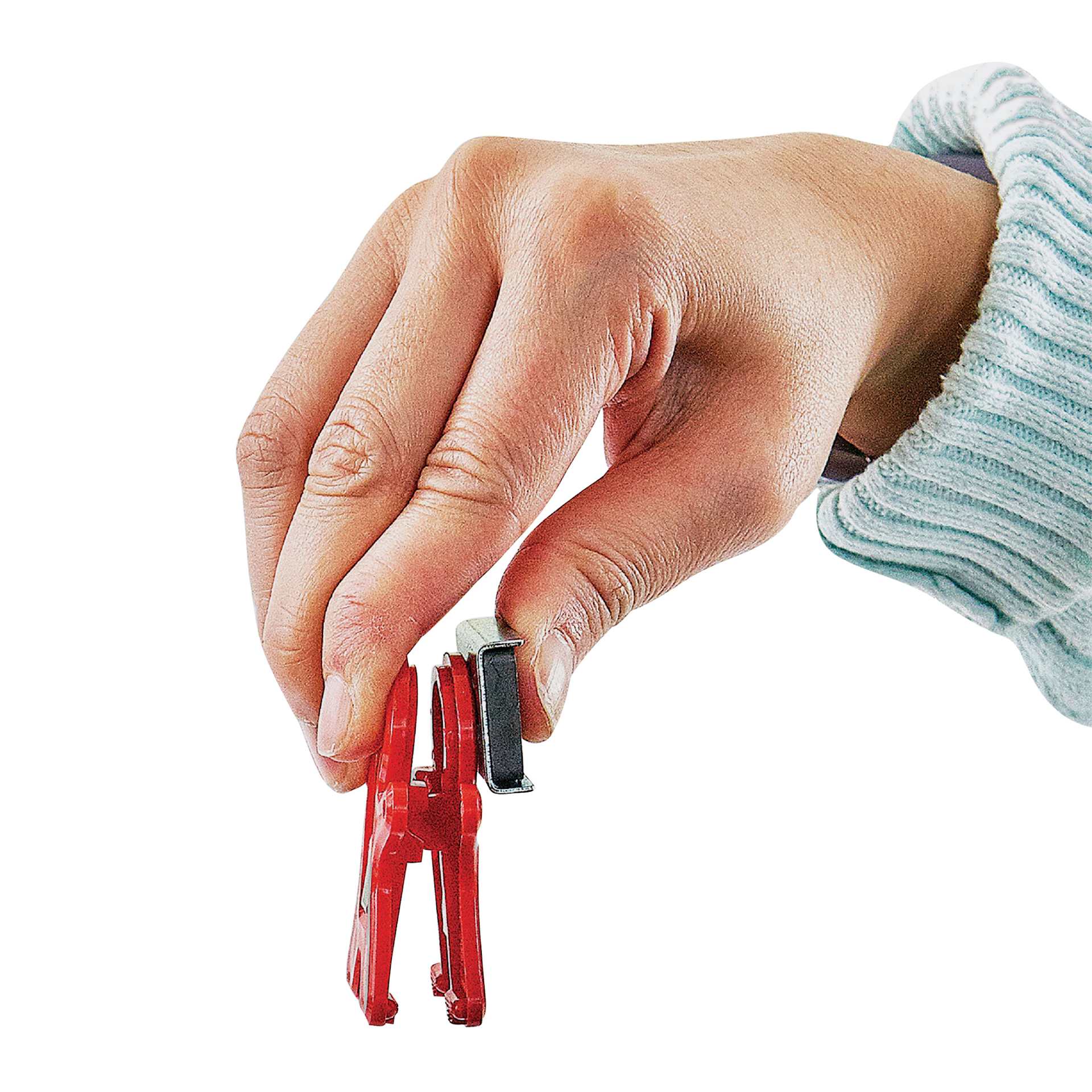 The Pencil Grip Magnet Man Magnetic Clip in hand
