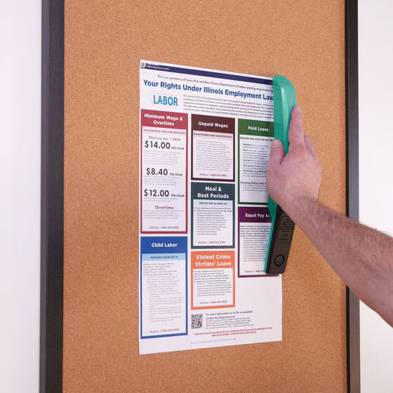 Swingline 545 Standard Stapler - Spring Green stapling paper to cork board