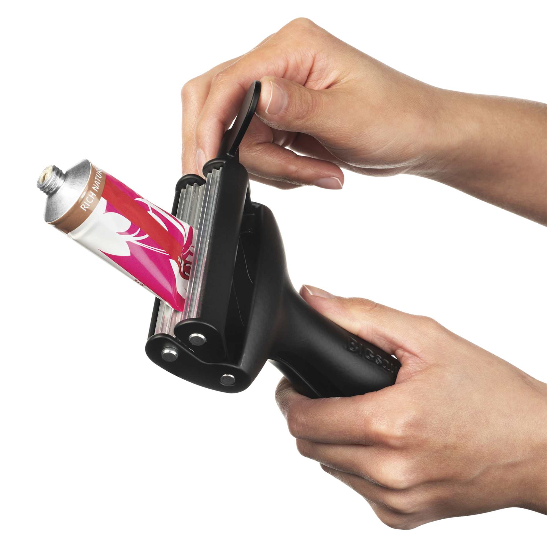 Tube Squeezer by Big Squeeze - Black, wringing a tube