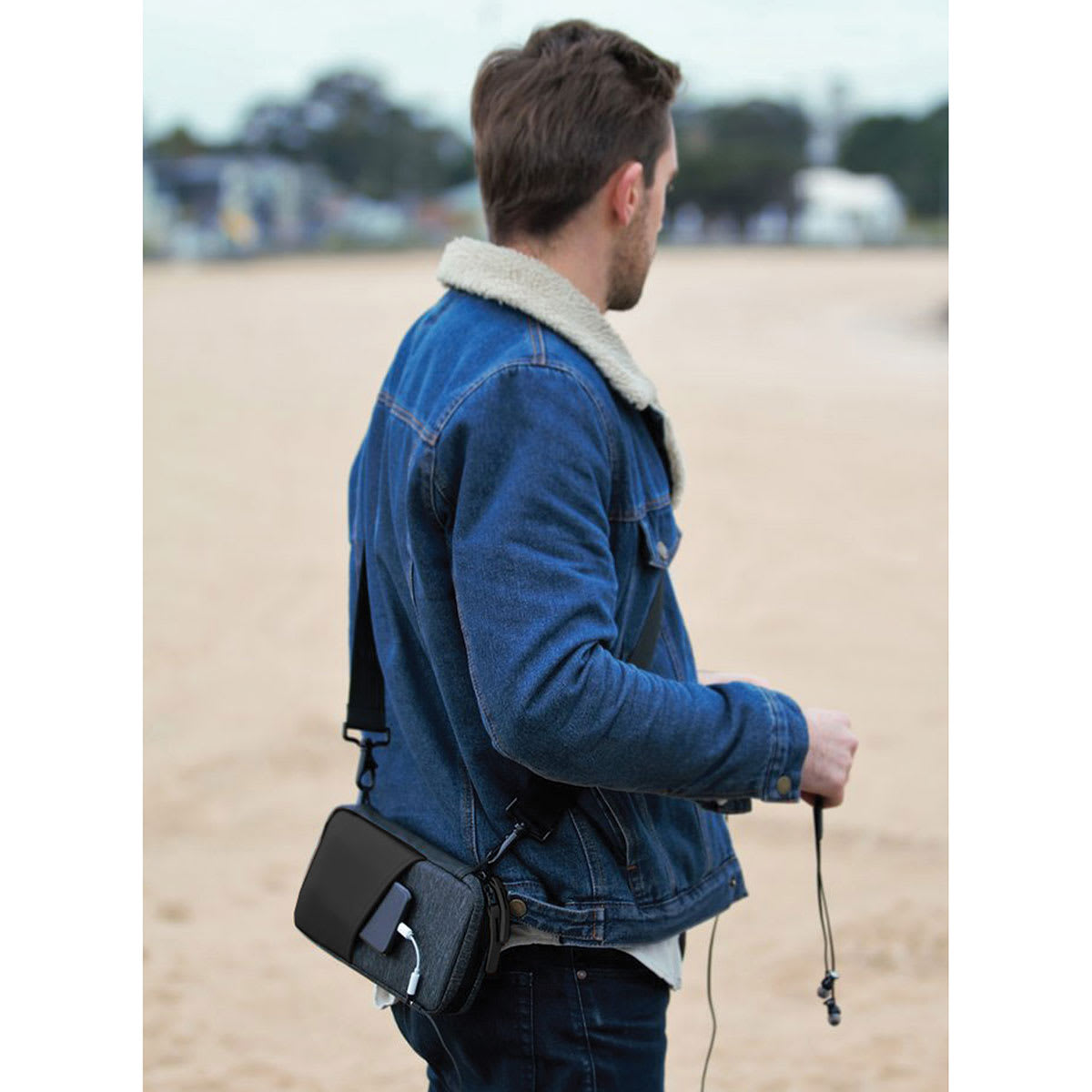Etchr Field Case being worn across the body.