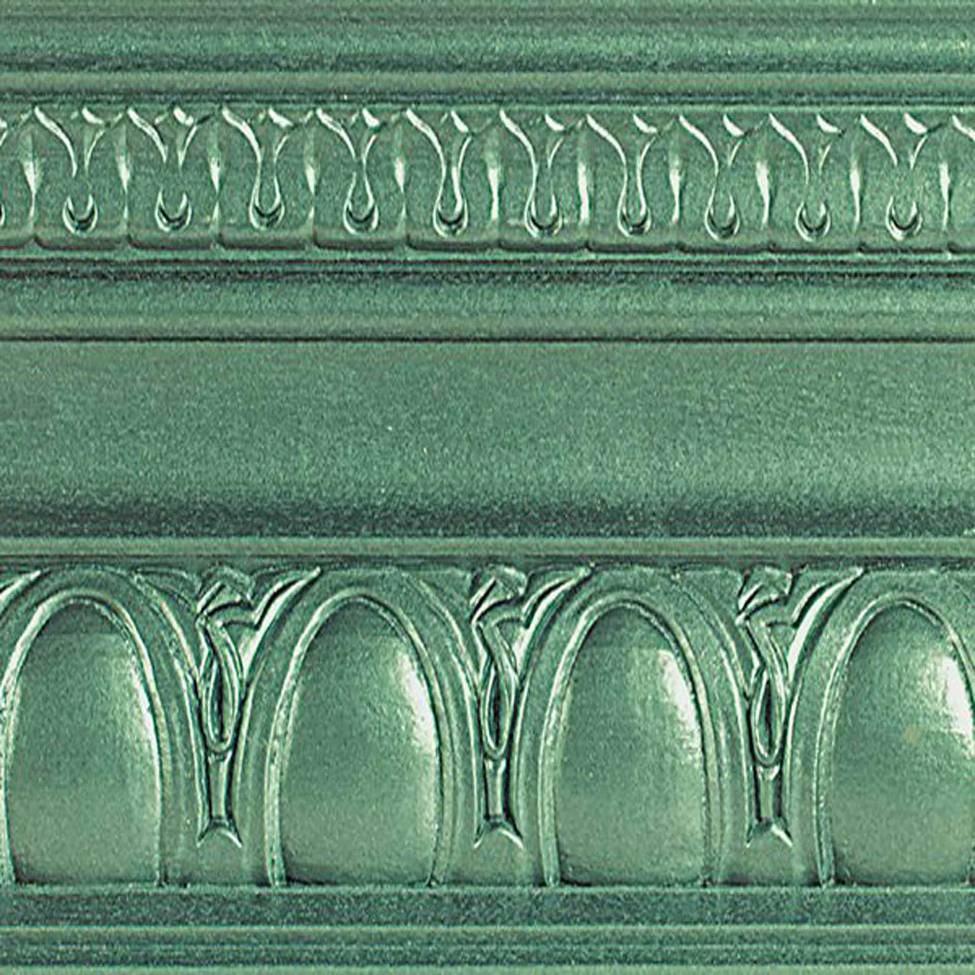 Modern Masters Metallic Paint - Mystical Green painted on a piece of trim