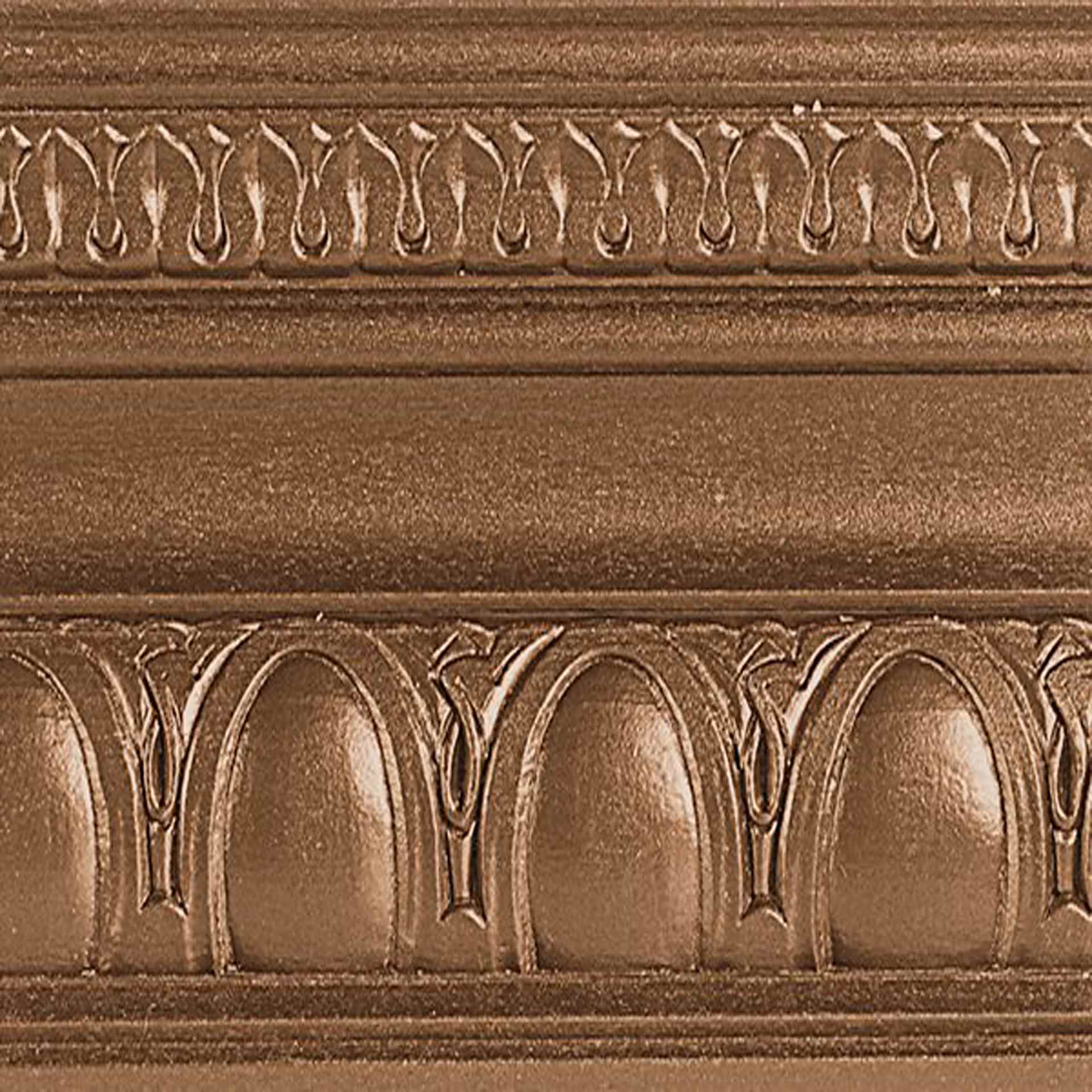 Modern Masters Metallic Paint - Antique Bronze painted on a piece of trim