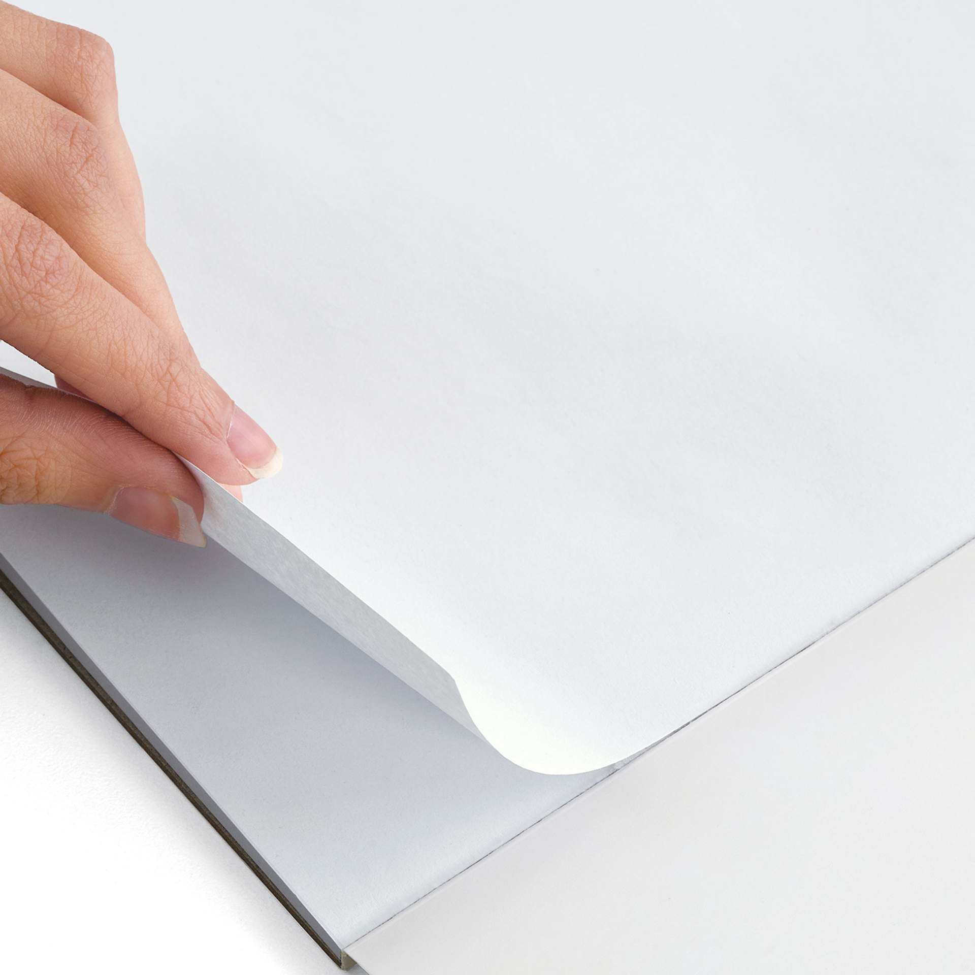 artPOP! Kids Marker Pad - 9" x 12", 40 Sheets (A hand lifting a sheet of paper)
