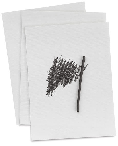 Blick Charcoal Paper - Three sheets stacked with charcoal and charcoal scribble on top sheet
