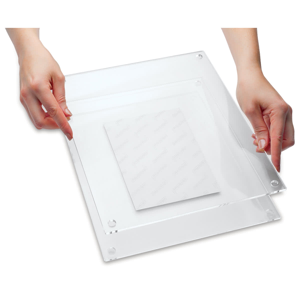 Wexel Art Double Panel Acrylic Display Frame - 28" x 40", hands assembling frame Wexel Art Double Panel Acrylic Display Frame - 28" x 40", hands assembling frame